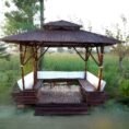 eco-bambo-bamboo-gazebo-bamboo-gazebo-with-white-drapes-and-comfortable-seating-area-1199707451